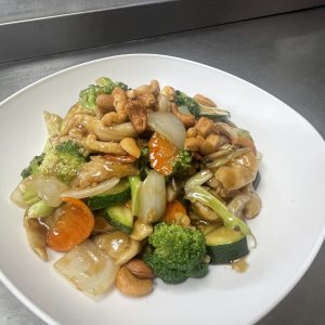 Broccoli, zucchini, onion, carrots, celery, topped with cashews