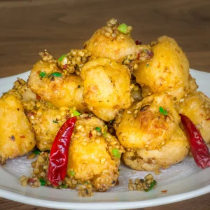 Breaded boneless chicken tossed in garlic, chili, salt & pepper