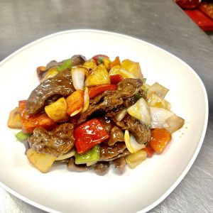 pineapple, bell peppers, onion in teriyaki sauce