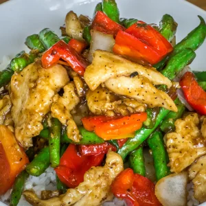 String beans, red bell pepper, onion, in a black bean sauce