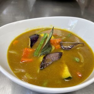 Eggplant, string bean, onion, peppers, carrot, and coconut milk